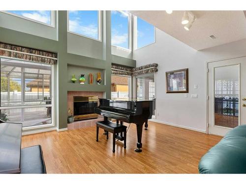 38 Edgevalley Manor Nw, Calgary, AB - Indoor Photo Showing Living Room With Fireplace