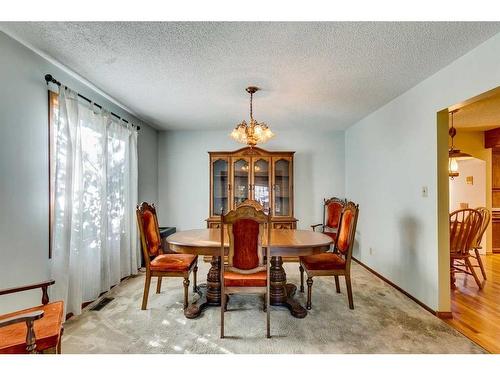 23 Bow Village Crescent Nw, Calgary, AB - Indoor Photo Showing Dining Room