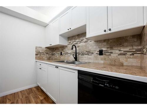 1207-6224 17 Avenue Se, Calgary, AB - Indoor Photo Showing Kitchen With Double Sink