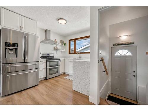 348 Weddenburn Road Se, Calgary, AB - Indoor Photo Showing Kitchen With Stainless Steel Kitchen