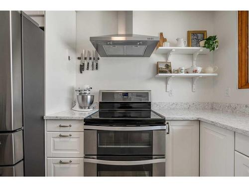 348 Weddenburn Road Se, Calgary, AB - Indoor Photo Showing Kitchen With Stainless Steel Kitchen With Upgraded Kitchen