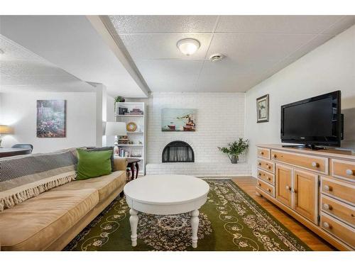 348 Weddenburn Road Se, Calgary, AB - Indoor Photo Showing Living Room