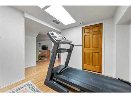 348 Weddenburn Road Se, Calgary, AB - Indoor Photo Showing Gym Room