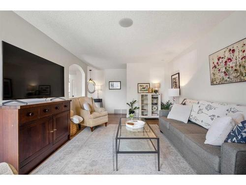 348 Weddenburn Road Se, Calgary, AB - Indoor Photo Showing Living Room