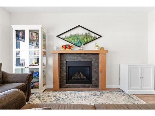 6 Coutts Close, Olds, AB - Indoor Photo Showing Living Room With Fireplace