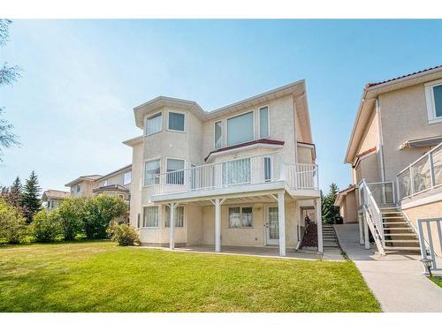 16 Hamptons Heath Nw, Calgary, AB - Outdoor With Deck Patio Veranda With Facade