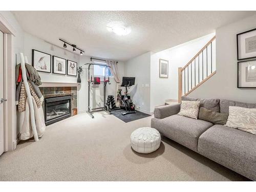 3-440 11 Avenue Ne, Calgary, AB - Indoor Photo Showing Living Room With Fireplace