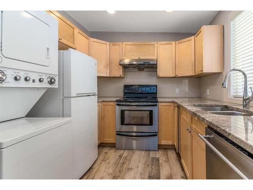 4822 1 Street Sw, Calgary, AB - Indoor Photo Showing Kitchen With Double Sink