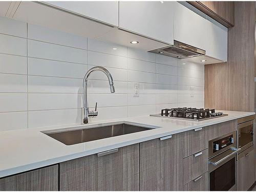 311-51 Waterfront Mews Sw, Calgary, AB - Indoor Photo Showing Kitchen With Upgraded Kitchen