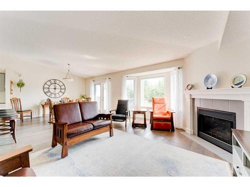 160 Valley Ridge Heights Nw, Calgary, AB - Indoor Photo Showing Living Room With Fireplace