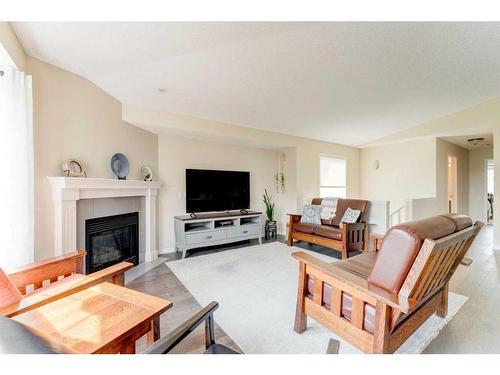 160 Valley Ridge Heights Nw, Calgary, AB - Indoor Photo Showing Living Room With Fireplace