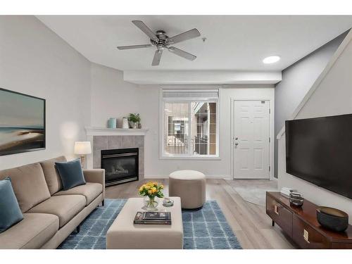 217-527 15 Avenue Sw, Calgary, AB - Indoor Photo Showing Living Room With Fireplace