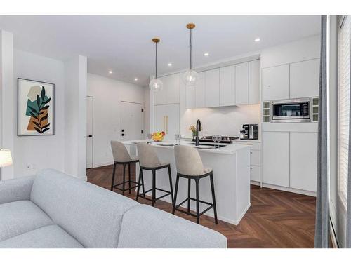 316-4275 Norford Avenue Nw, Calgary, AB - Indoor Photo Showing Kitchen With Double Sink With Upgraded Kitchen