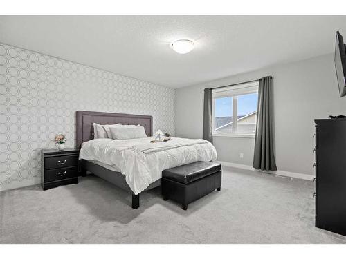 566 Silverado Boulevard Sw, Calgary, AB - Indoor Photo Showing Bedroom