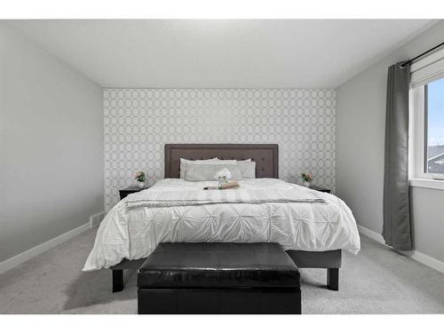 566 Silverado Boulevard Sw, Calgary, AB - Indoor Photo Showing Bedroom