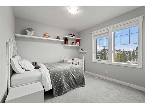 566 Silverado Boulevard Sw, Calgary, AB - Indoor Photo Showing Bedroom