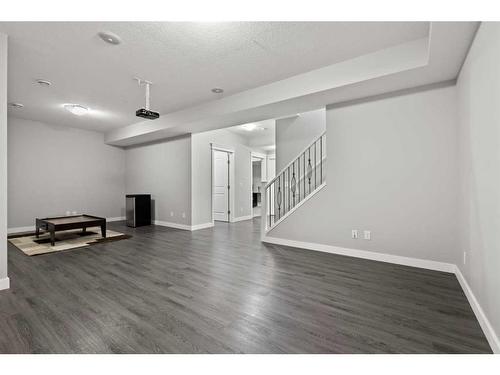 566 Silverado Boulevard Sw, Calgary, AB - Indoor Photo Showing Other Room