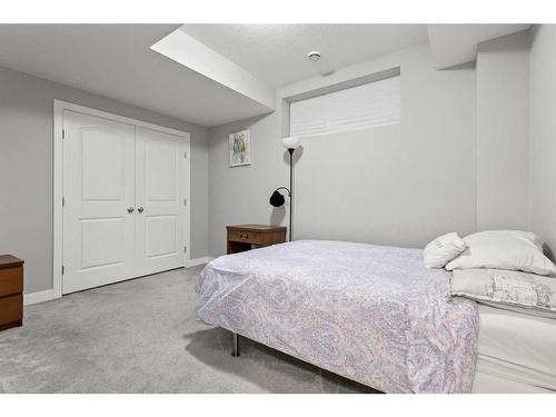 566 Silverado Boulevard Sw, Calgary, AB - Indoor Photo Showing Bedroom