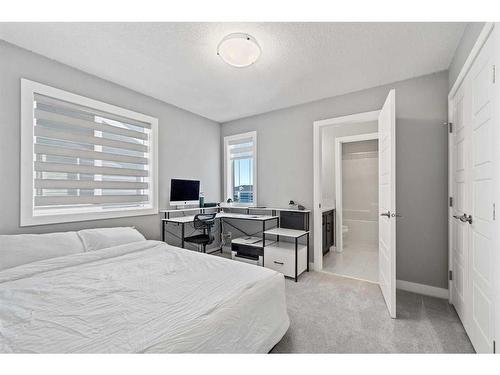 42 Waterford Road, Chestermere, AB - Indoor Photo Showing Bedroom