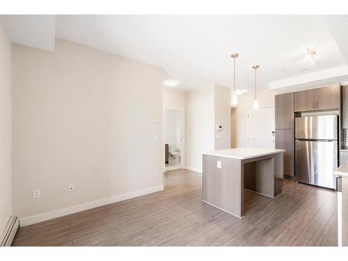 205-15233 1 Street Se, Calgary, AB - Indoor Photo Showing Other Room