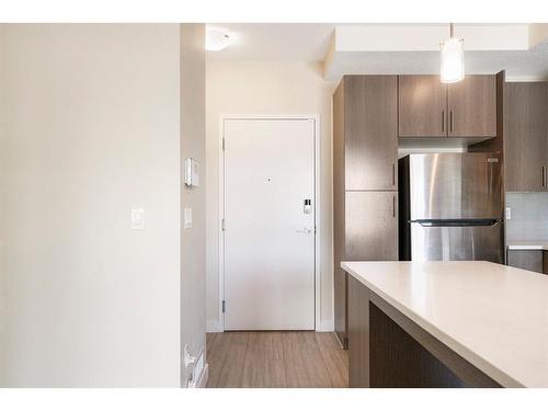 205-15233 1 Street Se, Calgary, AB - Indoor Photo Showing Kitchen With Stainless Steel Kitchen