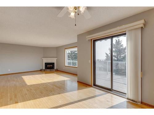 104 Norquay Heights Nw, Calgary, AB - Indoor With Fireplace