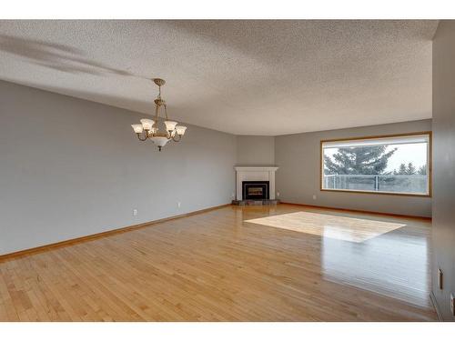 104 Norquay Heights Nw, Calgary, AB - Indoor With Fireplace