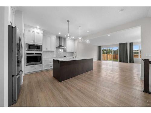 48 Cranbrook Manor Se, Calgary, AB - Indoor Photo Showing Kitchen With Upgraded Kitchen