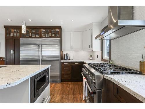 1023 Lake Bonavista Drive Se, Calgary, AB - Indoor Photo Showing Kitchen With Upgraded Kitchen