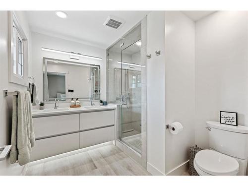 1023 Lake Bonavista Drive Se, Calgary, AB - Indoor Photo Showing Bathroom