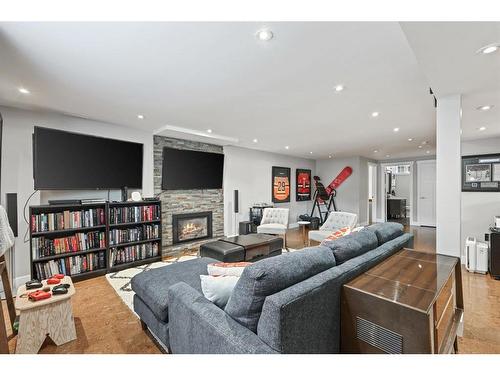 1023 Lake Bonavista Drive Se, Calgary, AB - Indoor Photo Showing Living Room With Fireplace