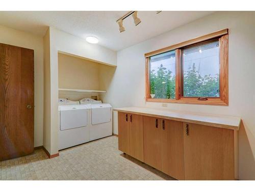 223 Silvercreek Drive Nw, Calgary, AB - Indoor Photo Showing Laundry Room