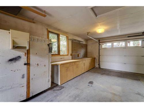 223 Silvercreek Drive Nw, Calgary, AB - Indoor Photo Showing Garage