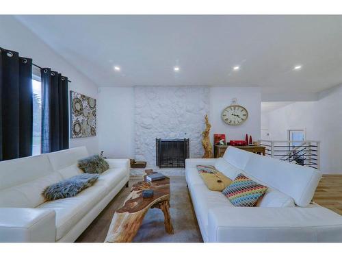 84 Southampton Drive Sw, Calgary, AB - Indoor Photo Showing Living Room With Fireplace