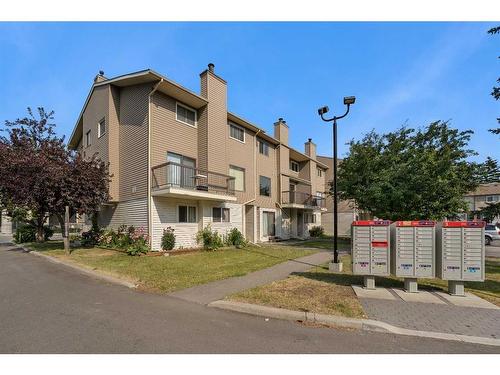 11-2519 38 Street Ne, Calgary, AB - Outdoor With Balcony With Facade