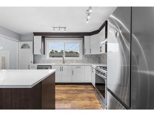 604 Fortalice Crescent Se, Calgary, AB - Indoor Photo Showing Kitchen With Upgraded Kitchen