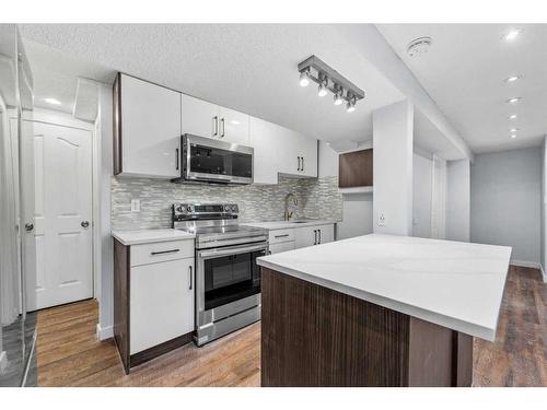 604 Fortalice Crescent Se, Calgary, AB - Indoor Photo Showing Kitchen With Upgraded Kitchen