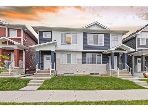 237 Creekside Drive Sw, Calgary, AB - Outdoor With Facade