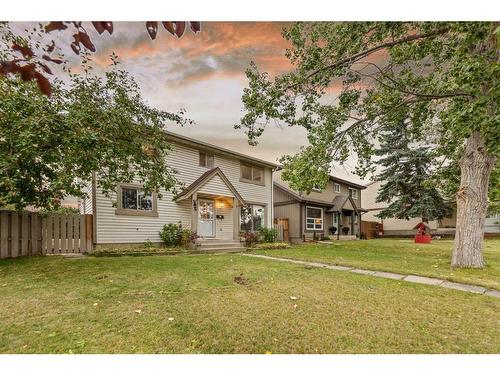 104 Falconridge Close Ne, Calgary, AB - Outdoor With Deck Patio Veranda