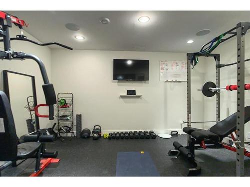 65 Walden Square Se, Calgary, AB - Indoor Photo Showing Gym Room