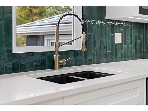 1725 28 Street Sw, Calgary, AB - Indoor Photo Showing Kitchen With Double Sink