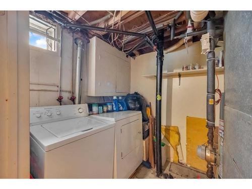 215 Rundlecairn Road Ne, Calgary, AB - Indoor Photo Showing Laundry Room