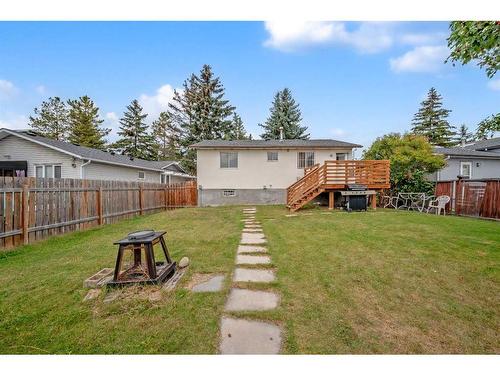 215 Rundlecairn Road Ne, Calgary, AB - Outdoor With Backyard