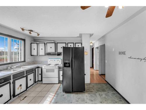 215 Rundlecairn Road Ne, Calgary, AB - Indoor Photo Showing Kitchen