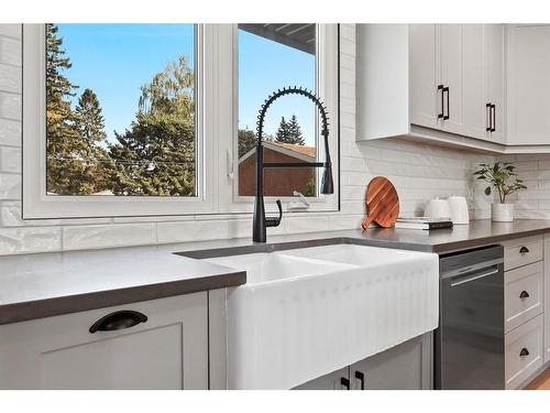 24 Westover Drive Sw, Calgary, AB - Indoor Photo Showing Kitchen With Double Sink