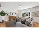 24 Westover Drive Sw, Calgary, AB  - Indoor Photo Showing Living Room 