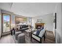 276 Jenner Crescent, Red Deer, AB  - Indoor Photo Showing Living Room With Fireplace 