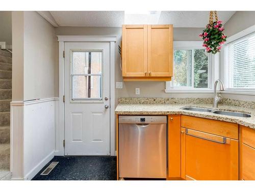 106 16 Street Nw, Calgary, AB - Indoor Photo Showing Kitchen With Double Sink