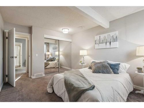 168 Oaktree Lane Sw, Calgary, AB - Indoor Photo Showing Bedroom