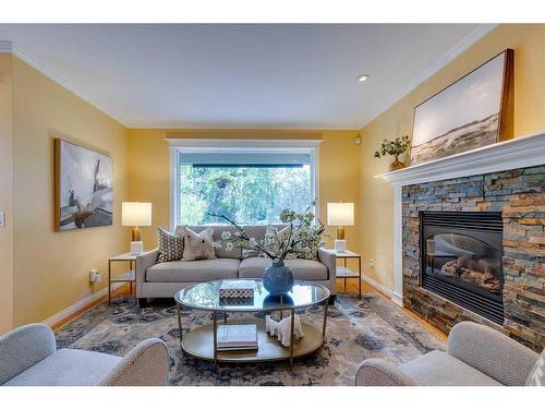 820 15 Street Nw, Calgary, AB - Indoor Photo Showing Living Room With Fireplace